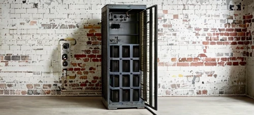 telephone booth,barebone computer,room divider,steel door,phone booth,digital safe,hinged doors,digital bi-amp powered loudspeaker,octobass,sound carrier,telephone hanging,metal cabinet,door-container,pay phone,switch cabinet,storage cabinet,payphone,vending machine,iron door,box-spring