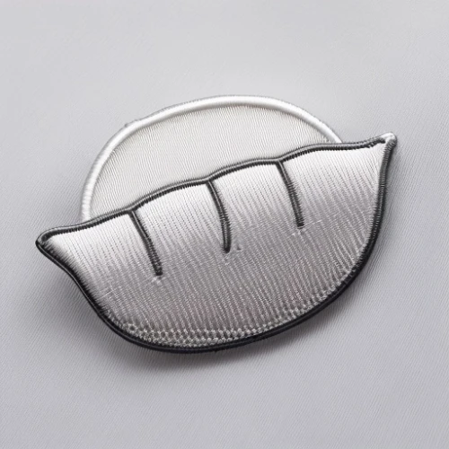 car badge,lincoln motor company,car icon,pin-back button,mercedes benz car logo,mercedes seat warmers,metal grille,r badge,chrysler 300 letter series,ventilation grille,rs badge,tennis racket accessory,grille,belt buckle,surfboard fin,m badge,bonnet ornament,t badge,w badge,kr badge