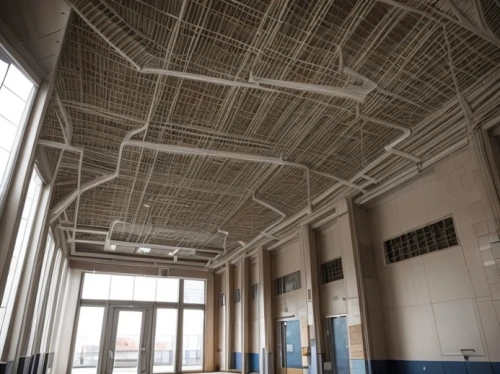 ceiling construction,ceiling ventilation,hall roof,structural plaster,concrete ceiling,ventilation grid,commercial hvac,roof structures,steel scaffolding,thermal insulation,daylighting,factory hall,empty hall,roof truss,facade insulation,steel construction,fire sprinkler system,ceiling fixture,industrial hall,reinforced concrete