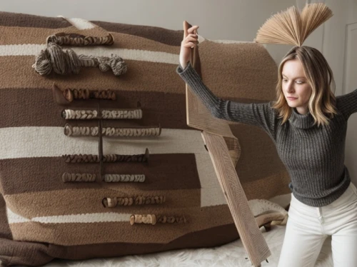 pillow fight,brown fabric,wood wool,jute sack,cardboard background,burlap,sofa cushions,cork wall,corrugated cardboard,pillows,scandinavian style,rolls of fabric,slipcover,bean bag chair,blonde woman reading a newspaper,sackcloth textured,kraft paper,sheep wool,cloves schwindl inge,mound-building termites,Interior Design,Living room,Northern Europe,Nordic Harmony