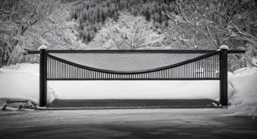 snow bridge,fence gate,snow shelter,metal gate,downstream gate,outdoor bench,bench,moveable bridge,monochrome photography,blackandwhitephotography,gates,empty swing,white picket fence,footbridge,iron gate,bus shelters,gate,garden fence,front gate,fence