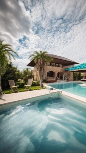 pool house,florida home,luxury home,luxury property,holiday villa,tropical house,dunes house,outdoor pool,swimming pool,mansion,roof top pool,pool water surface,beautiful home,crib,bendemeer estates,infinity swimming pool,pool cleaning,large home,luxury real estate,roof landscape