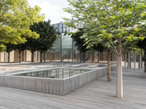 holocaust memorial,glass facade,archidaily,paving slabs,glass blocks,botanical square frame,plane trees,glass facades,9 11 memorial,holocaust museum,apple store,corten steel,structural glass,school design,concrete slabs,public space,metal cladding,water wall,glass wall,chancellery,Architecture,General,Modern,Sustainable Innovation