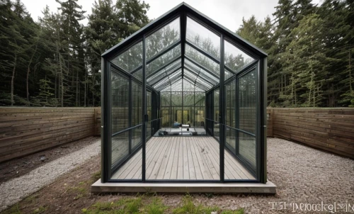 mirror house,glass roof,frame house,structural glass,greenhouse cover,glass pyramid,hahnenfu greenhouse,cubic house,greenhouse,folding roof,glass building,glass facade,transparent window,long glass,glass panes,greenhouse effect,inverted cottage,glass window,glass wall,roof lantern,Architecture,General,Modern,Industrial Modernism