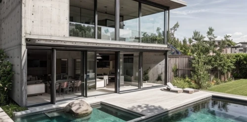 modern house,exposed concrete,modern architecture,dunes house,cubic house,concrete construction,concrete ceiling,structural glass,pool house,glass facade,concrete slabs,mid century house,residential house,luxury property,private house,concrete,mirror house,house hevelius,beautiful home,reinforced concrete,Architecture,General,Masterpiece,Social Modernism