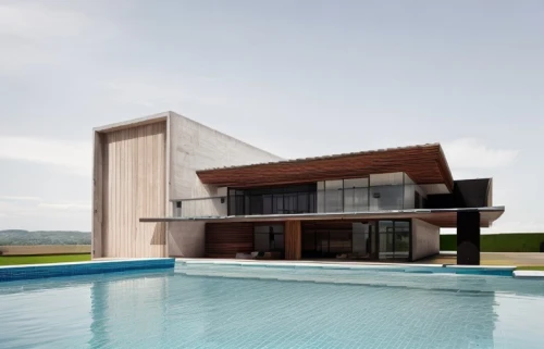 modern house,dunes house,pool house,modern architecture,cubic house,cube house,holiday villa,residential house,corten steel,house by the water,villa,luxury property,private house,house with lake,house shape,archidaily,frame house,contemporary,cube stilt houses,infinity swimming pool,Architecture,General,Masterpiece,Minimalist Modernism