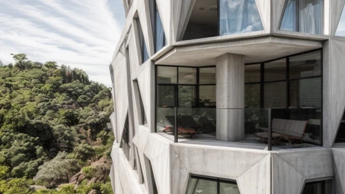casa fuster hotel,cubic house,hotel w barcelona,exposed concrete,sky apartment,dunes house,block balcony,athens art school,cliff dwelling,cube house,concrete construction,mirror house,concrete ceiling,hanging houses,modern architecture,archidaily,penthouse apartment,boutique hotel,lattice windows,skyscapers
