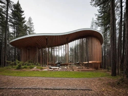 forest chapel,house in the forest,timber house,wooden sauna,wood structure,forest workplace,wood doghouse,outdoor structure,wooden construction,archidaily,log home,tree house hotel,slice of wood,wave wood,möngö,round hut,dunes house,eco-construction,the cabin in the mountains,log cabin