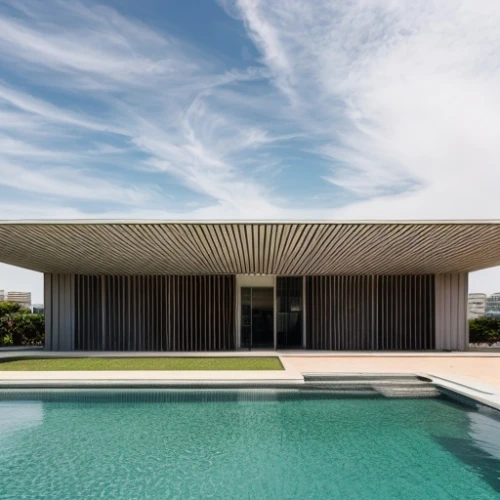 dunes house,pool house,modern house,residential house,archidaily,timber house,modern architecture,folding roof,roof landscape,house shape,flat roof,mid century house,summer house,beach house,house roof,concrete ceiling,cubic house,wooden decking,holiday villa,residential