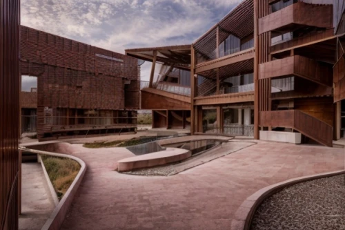 corten steel,eco hotel,dunes house,cubic house,kirrarchitecture,arq,modern architecture,cube house,archidaily,courtyard,building honeycomb,residential,house hevelius,school design,cube stilt houses,contemporary,inside courtyard,business school,timber house,dormitory