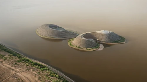 artificial island,floating islands,cooling towers,artificial islands,floating huts,cooling tower,saltworks,aquaculture,qasr azraq,wastewater treatment,sewage treatment plant,floating production storage and offloading,the shrimp farm,fish farm,nuclear power plant,mushroom island,round house,aerial landscape,maasvlakte,round hut