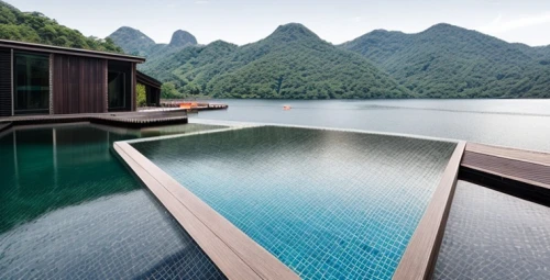 infinity swimming pool,floating huts,roof landscape,outdoor pool,wooden decking,house with lake,vietnam,guilin,asian architecture,house by the water,danyang eight scenic,house in mountains,roof top pool,southeast asia,guizhou,pool house,floating over lake,calm water,swimming pool,house in the mountains,Architecture,General,Modern,Mid-Century Modern