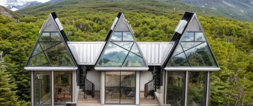 mirror house,house in the mountains,house in mountains,hahnenfu greenhouse,glass building,frame house,cubic house,glass pyramid,structural glass,mountain hut,zermatt,eco hotel,alpine style,glass facade,the cabin in the mountains,private house,modern architecture,transparent window,swiss house,inverted cottage