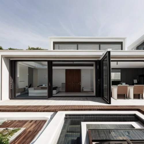 modern house,cubic house,folding roof,residential house,modern architecture,dunes house,landscape design sydney,flat roof,cube house,garden design sydney,frame house,residential,roof landscape,core renovation,landscape designers sydney,sliding door,house roof,timber house,archidaily,glass facade