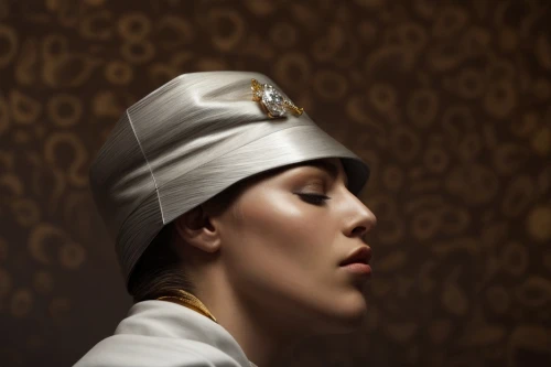 the hat of the woman,gold cap,bellboy,pickelhaube,art deco woman,conceptual photography,the hat-female,orientalism,zoroastrian novruz,beret,girl with a pearl earring,stewardess,peaked cap,woman's hat,sailor,retouching,crown cap,kokoshnik,gold foil men's hat,cleopatra,Product Design,Jewelry Design,Europe,Innovative