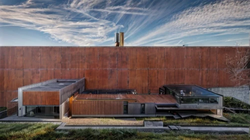 corten steel,dunes house,archidaily,roof landscape,timber house,ruhl house,landscape design sydney,residential house,mid century house,modern architecture,modern house,cubic house,flat roof,brick house,metal cladding,landscape designers sydney,exposed concrete,roof tile,flock house,house hevelius