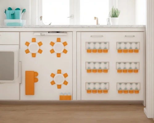changing table,storage cabinet,bathroom cabinet,baby changing chest of drawers,tile kitchen,lego building blocks pattern,laundry room,candy corn pattern,letter blocks,food storage containers,pieces of orange,pantry,kitchenette,fanta,pills dispenser,the tile plug-in,nursery decoration,carrot print,kitchen cabinet,baby room