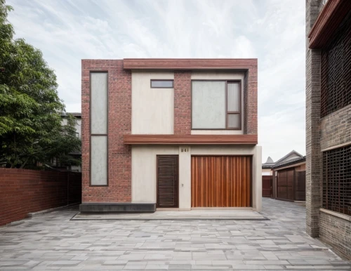 sand-lime brick,brick house,red bricks,brick block,red brick,cubic house,residential house,brickwork,timber house,frame house,cube house,clay house,lattice windows,two story house,house shape,corten steel,paved square,modern architecture,modern house,housebuilding,Architecture,General,Masterpiece,Vernacular Modernism