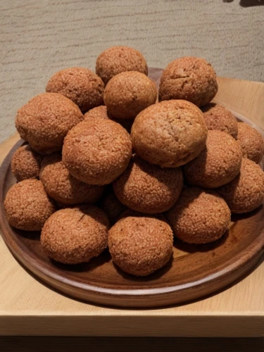 rasgula,amaretti di saronno,kibbeh,brigadeiros,bombolone,ricciarelli,kourabiedes,pandebono,lebkuchen,gingerbread buttons,sufganiyah,mandazi,canarian wrinkly potatoes,loukoumades,coxinha,oatmeal balls,whole-wheat flour,coconut balls,marzipan balls,dorayaki