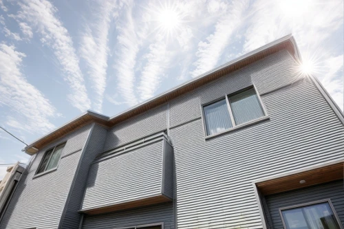 metal cladding,roller shutter,prefabricated buildings,cubic house,facade panels,housebuilding,new housing development,frame house,thermal insulation,sand-lime brick,cube house,folding roof,heat pumps,residential house,exterior decoration,timber house,modern architecture,modern house,archidaily,wooden facade,Architecture,General,Modern,Postmodern Playfulness