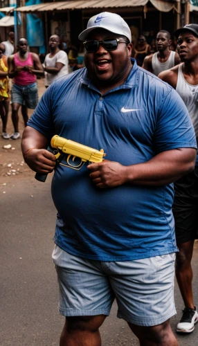 strongman,plus-size model,vuvuzela,fitness coach,shot put,aerobic exercise,physical exercise,diet icon,sport aerobics,anmatjere man,fitness model,half-marathon,fat,people of uganda,personal trainer,fitness professional,woman holding gun,sports exercise,long-distance running,middle-distance running