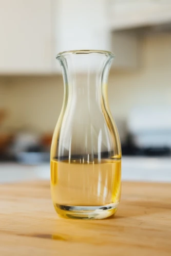 carafe,erlenmeyer flask,decanter,balsamic vinegar,coconut oil in glass jar,laboratory flask,glass jar,consomm￩ cup,glasswares,glass vase,walnut oil,sesame oil,tea glass,cooking oil,whiskey glass,stemless gentian,flavoring dishes,glass container,water glass,measuring cup