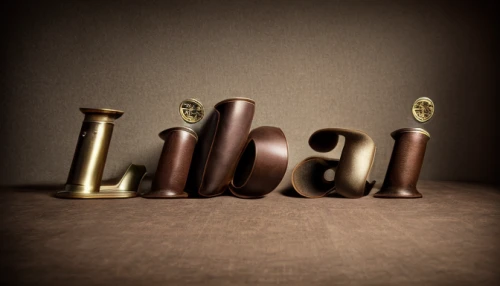 chocolate letter,wooden letters,decorative letters,typography,scrabble letters,wooden signboard,letters,cinema 4d,wooden sign,letter chain,wood type,helical,still life photography,stack of letters,linear,lettering,conceptual photography,chocolatier,eclair,illegal,Realistic,Fashion,Luxury And Sophistication