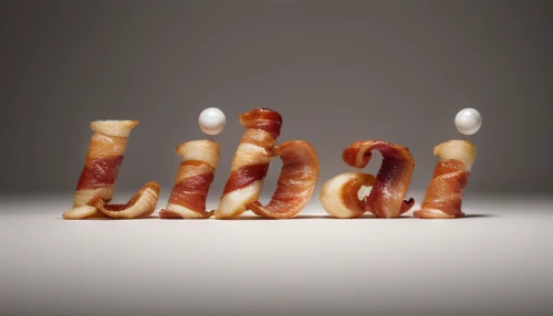 bacon tree,meat carving,bacon,sausages in a dressing gown,bacon egg cup,salumi,pancetta,bacon rolls,sausage plate,food styling,mouse bacon,pretzel sticks,kielbasa,back bacon,ron mueck,menorah,baconator,scrabble letters,saucisson de lyon,alphabet pasta,Realistic,Foods,Bacon