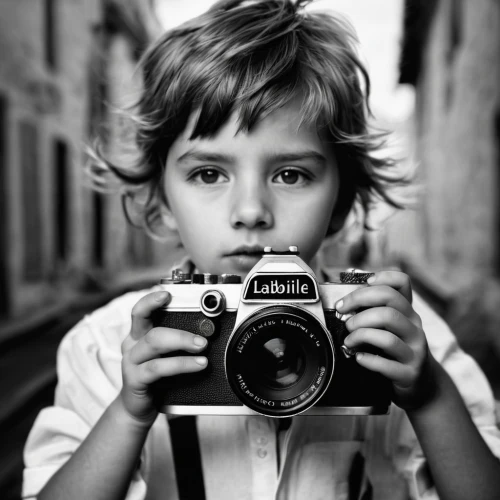 photographing children,photographer,a girl with a camera,camera photographer,slr camera,portrait photographers,photographing,photo-camera,taking photo,taking picture,photographers,vintage camera,photographs,camerist,paparazzo,classic photography,the blonde photographer,nikon,take a photo,monochrome photography,Photography,Black and white photography,Black and White Photography 02