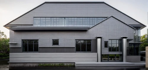 folding roof,modern house,metal roof,danish house,frame house,slate roof,timber house,metal cladding,modern architecture,house shape,glass facade,cubic house,wooden house,two story house,residential house,new england style house,flat roof,cube house,glass roof,brick house,Architecture,Commercial Building,Futurism,Futuristic 9