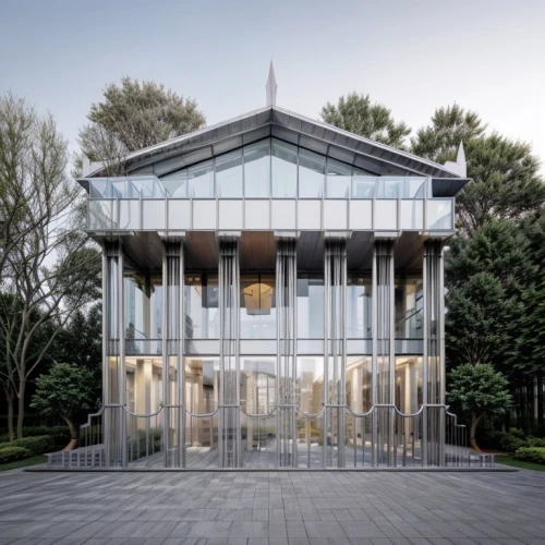 glass facade,mirror house,glass building,structural glass,glass facades,cubic house,house hevelius,cube house,frame house,archidaily,metal cladding,modern architecture,mortuary temple,timber house,chancellery,modern house,glass panes,summer house,dupage opera theatre,glass blocks,Architecture,Small Public Buildings,Modern,Fluid Geometry