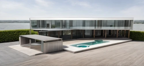 infinity swimming pool,luxury property,modern house,roof top pool,pool house,house by the water,3d rendering,dunes house,luxury bathroom,luxury home,dug-out pool,luxury real estate,outdoor pool,landscape design sydney,water sofa,modern architecture,lago grey,roof terrace,glass wall,private house