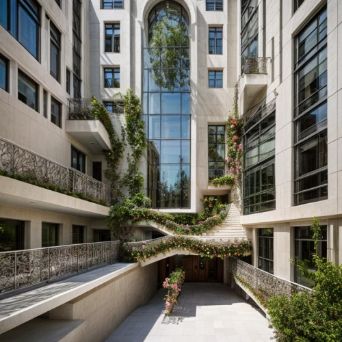 arborist,robinia,flourishing tree,appartment building,eco-construction,courtyard,kirrarchitecture,palma trees,the boulevard arjaan,biotechnology research institute,hotel w barcelona,glass facade,silk tree,tree pruning,tel aviv,maidenhair tree,modern architecture,garden design sydney,residences,trees with stitching,Architecture,Campus Building,European Traditional,Spanish Rococo