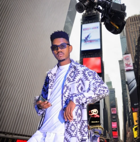 african businessman,african man,african boy,african culture,european starlin,time square,movie premiere,novelist,fashion street,man's fashion,fashion model,solo entertainer,a black man on a suit,black businessman,african,street fashion,fashion shoot,fashionista,walk of fame,cameroon