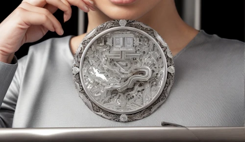 woman holding a smartphone,decorative plate,ladies pocket watch,ornate pocket watch,reading magnifying glass,magnifier glass,woman holding pie,icon magnifying,door knocker,helmet plate,magnifying glass,bonnet ornament,girl with cereal bowl,woman eating apple,belt buckle,wall plate,art deco woman,telephone accessory,watchmaker,girl at the computer,Product Design,Jewelry Design,Europe,French Modern