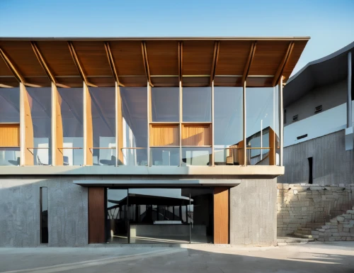 dunes house,timber house,archidaily,modern architecture,exposed concrete,wooden facade,cubic house,corten steel,glass facade,residential house,school design,modern house,frame house,house hevelius,kirrarchitecture,structural glass,architectural,contemporary,metal cladding,swiss house
