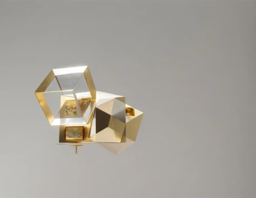 cubic,wall lamp,wall light,wooden cubes,sconce,quartz clock,3d object,gold spangle,table lamp,cube surface,gold foil shapes,gold foil corner,geometric solids,chess cube,ball cube,crown render,isometric,cubes,mechanical puzzle,constellation pyxis,Product Design,Jewelry Design,Europe,Innovative