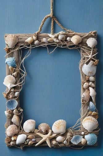 driftwood,bird nests,nautical bunting,door wreath,sea shells,blue sea shell pattern,beachcombing,decorative frame,flotsam and jetsam,wisteria shelf,sea shell,frame ornaments,block and tackle,shabby-chic,shabby chic,hanging decoration,beach shell,blue leaf frame,crab pot,seashells,Photography,Documentary Photography,Documentary Photography 31