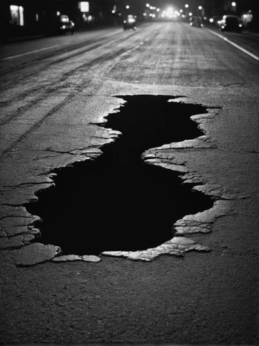 pot hole,road surface,asphalt,bad road,puddle,spills,earthquake,earth quake,paved,oil drop,bitumen,oil track,roads,sinkhole,pavement,crude,road dolphin,slippery road,road forgotten,puddles,Photography,Black and white photography,Black and White Photography 09