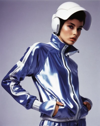 silvery blue,bolero jacket,protective clothing,protective suit,sportswear,bicycle helmet,high-visibility clothing,menswear for women,retro eighties,safety helmet,astronaut helmet,mazarine blue,audrey hepburn,bicycle clothing,spacesuit,jockey,equestrian helmet,retro woman,astronaut suit,shoulder pads,Photography,Fashion Photography,Fashion Photography 19