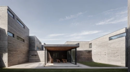 exposed concrete,residential house,archidaily,dunes house,modern house,cubic house,modern architecture,corten steel,house hevelius,glass facade,concrete construction,timber house,reinforced concrete,residential,cube house,frisian house,kirrarchitecture,metal cladding,frame house,wooden facade