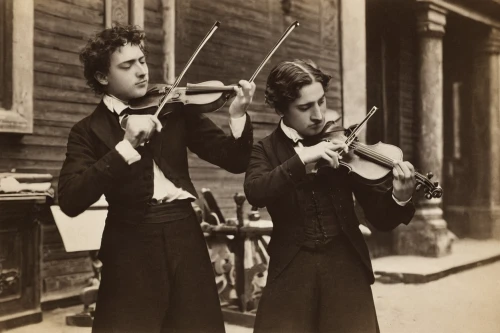 violinists,woman playing violin,playing the violin,violist,violinist,orchestra,musicians,concertmaster,violinist violinist,violin woman,bass violin,violin player,plucked string instruments,violins,philharmonic orchestra,violin,solo violinist,symphony orchestra,orchesta,street musicians,Photography,Black and white photography,Black and White Photography 15