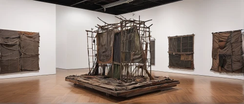 sackcloth,klaus rinke's time field,the sculptures,bronze wall,steel sculpture,iron wood,sculptor ed elliott,guillotine,wooden poles,clotheshorse,iron door,postmasters,staves,universal exhibition of paris,made of wood,wooden figures,garment racks,vestment,art world,installation,Conceptual Art,Daily,Daily 18