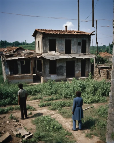 13 august 1961,destroyed houses,color image,woman house,1950s,1965,block of houses,human settlement,1952,row of houses,village life,1967,village scene,settlement,people of uganda,lubitel 2,old home,old houses,model years 1958 to 1967,1971,Photography,Documentary Photography,Documentary Photography 12