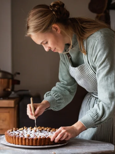 danish nut cake,woman holding pie,petit gâteau,girl in the kitchen,swede cakes,cake decorating,eieerkuchen,pastry chef,confectioner,food styling,piping tips,linzer torte,dobos torte,reibekuchen,confection,woman eating apple,pepper cake,torte,cake decorating supply,carrot cake,Photography,Documentary Photography,Documentary Photography 27