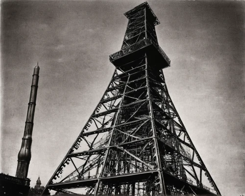 eiffel tower under construction,steel tower,year of construction 1954 – 1962,transmitter,oil rig,drilling rig,oil platform,transmission mast,transmitter station,radio tower,cellular tower,communications tower,antenna tower,impact tower,drillship,electric tower,the large crane,transmission tower,fire tower,year of construction 1937 to 1952,Photography,Black and white photography,Black and White Photography 15
