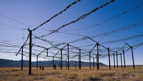 wire fence,ribbon barbed wire,barbed wire,wire fencing,barb wire,prison fence,barbwire,chain-link fencing,electric fence,unfenced,fences,wire mesh fence,nato wire,bird protection net,chain fence,pasture fence,fence,mojave desert,wire mesh,western debt and the handling,Photography,Documentary Photography,Documentary Photography 37