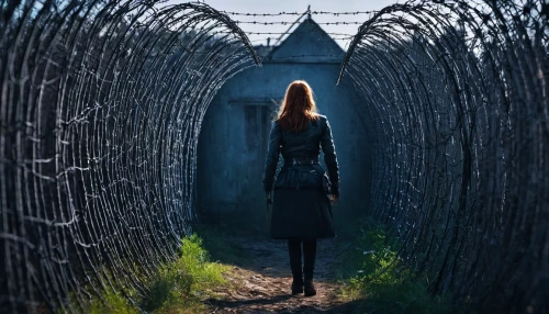 wall tunnel,tunnel,girl walking away,arrival,woman walking,prisoner,passage,escape,hollow way,escaping,barb wire,prison,auschwitz,the path,barbed wire,unfenced,escape route,prison fence,barbwire,auschwitz i,Photography,Documentary Photography,Documentary Photography 25