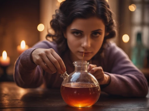 candlemaker,kombucha,consommé,sazerac,ayurveda,pouring tea,creating perfume,woman drinking coffee,oil lamp,laboratory flask,old fashioned glass,female alcoholism,erlenmeyer flask,potions,kerosene,conjure up,distillation,consommé cup,apple cider vinegar,oxidizing agent,Photography,General,Cinematic