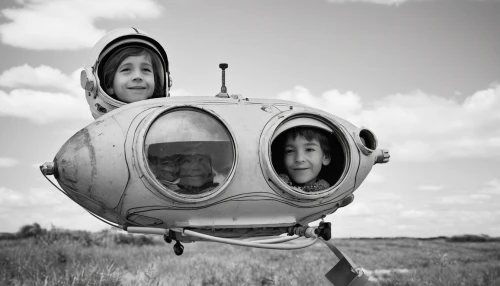 space capsule,nomadic children,diving bell,capsule,mobile home,rocketship,lifebuoy,photographing children,moon vehicle,diving helmet,aerostat,hovercraft,parabolic mirror,vintage children,kite buggy,conceptual photography,porthole,spacecraft,space tourism,bee-dome,Photography,Black and white photography,Black and White Photography 02